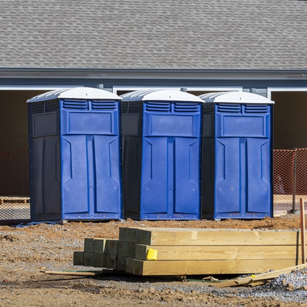 how often are the portable restrooms cleaned and serviced during a rental period in The Village OK